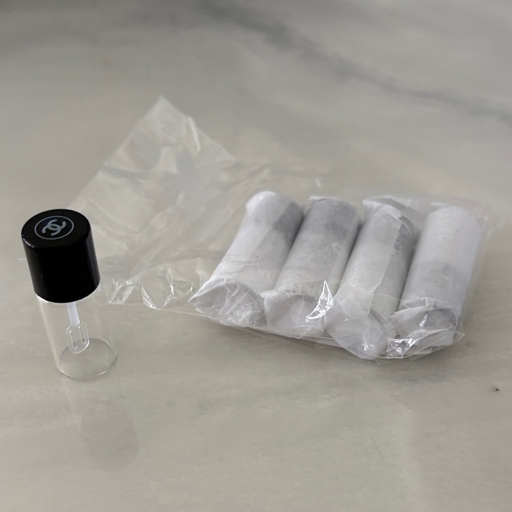 CHANEL Clear Glass Mini Vial with Black Logo Cap
Set of Five